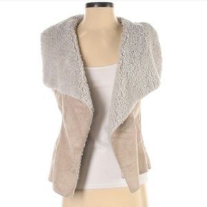 Tan faux fur lined open front vest